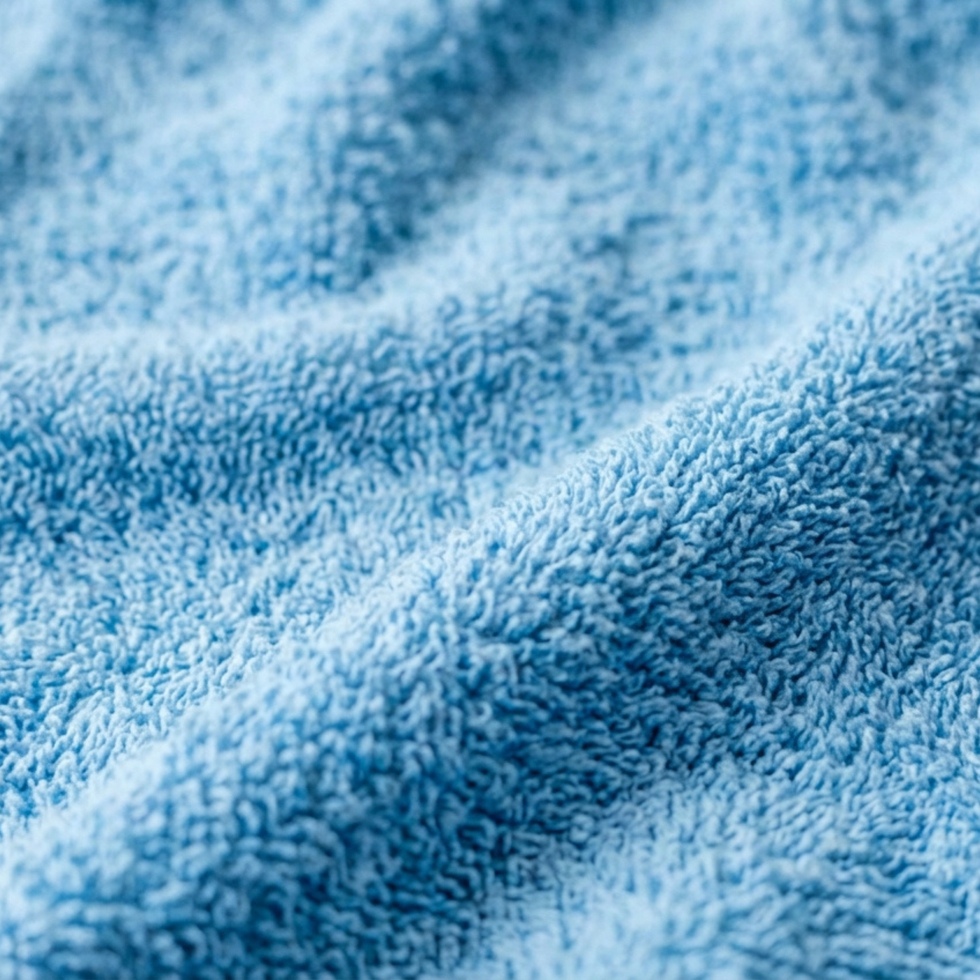 Detail hemelsblauwe hotelkwaliteit handdoek 